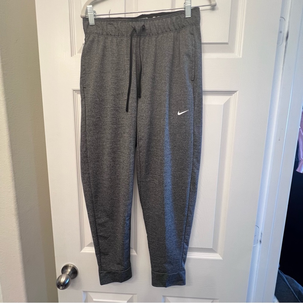 Nike Gray Sweatpants with Tapered Fit and Cuffed Ankles